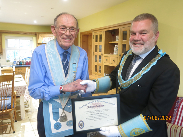 WBro Ivan Brown receiving his 65 year certificate from the Provincial Grand Master, RWBro Johnny Woods.